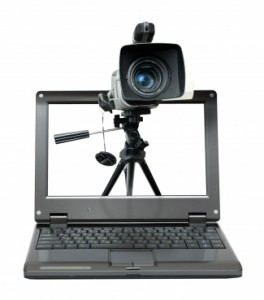 video marketing: laptop with camera tripod